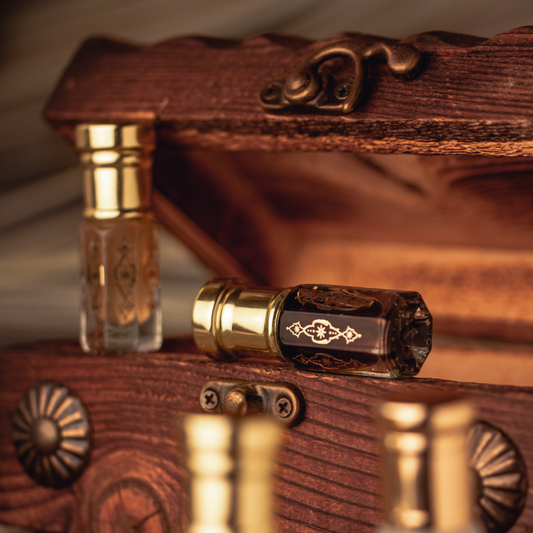 Two perfume bottles stand beside an open treasure chest, symbolizing luxury and opulence in fragrance. The chest lid is lifted, revealing the precious contents within, evoking the allure of discovery and indulgence.